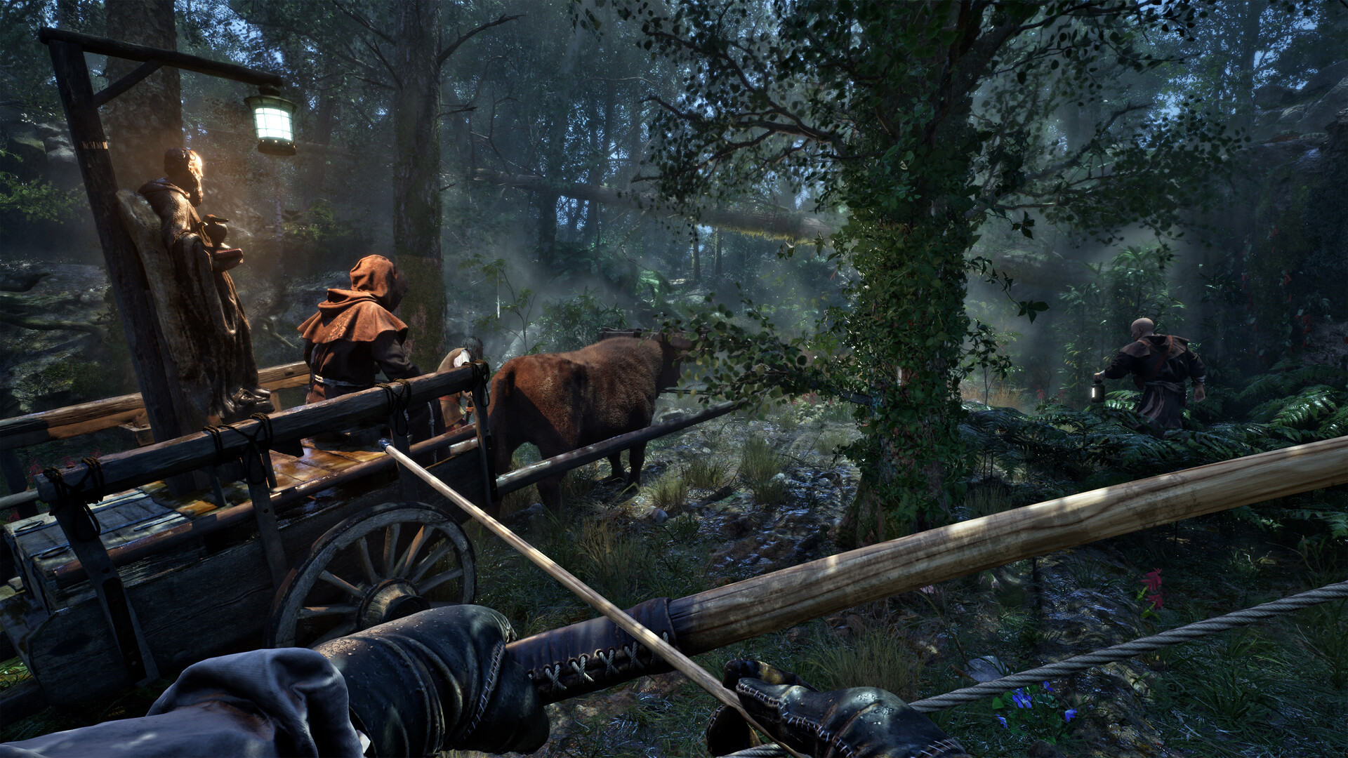 An expedition escorts an ox-wagon through a dark jungle.